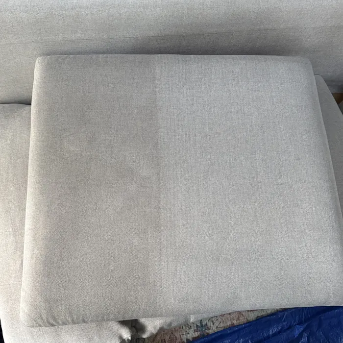 Light gray cushion half cleaned