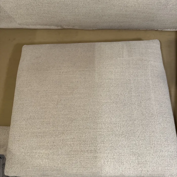 Linen cushion half cleaned
