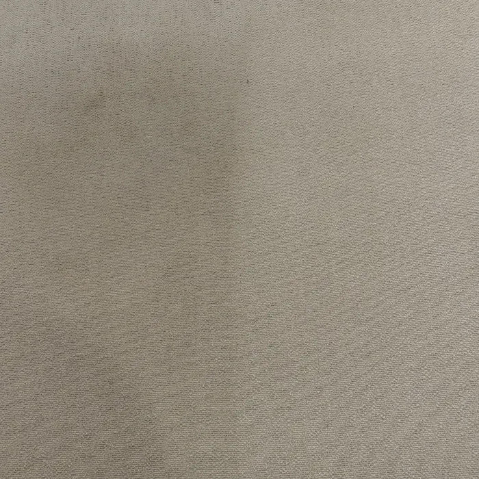 Beige fabric half cleaned